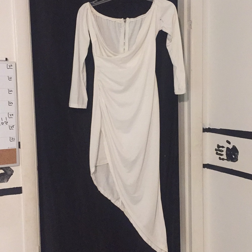 Form fitting all white Dagger Drop dress